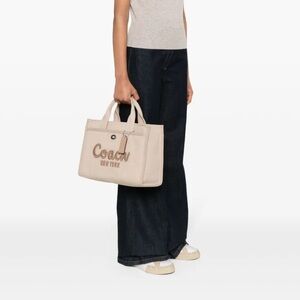 Coach Black and Tan Canvas Tote